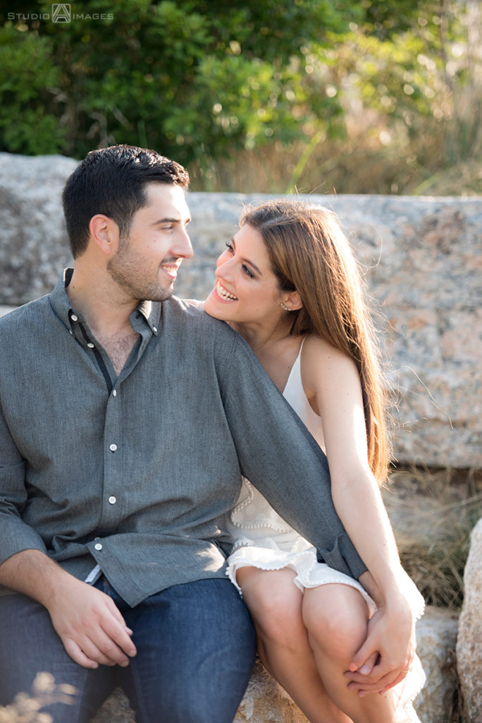 couple posing for their engagement photos at Governors Island