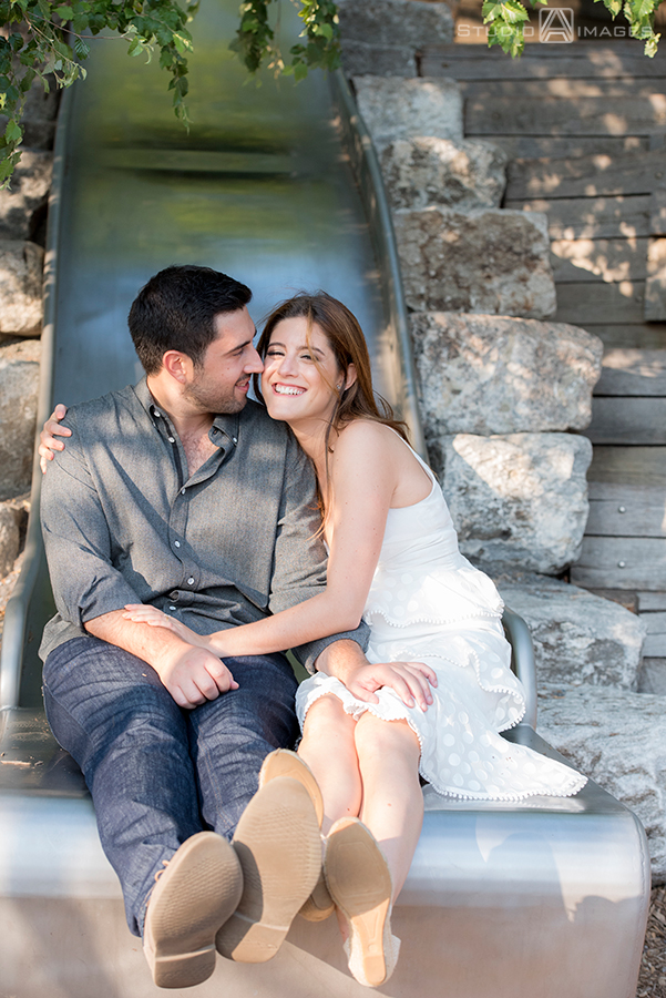 couple posing for their engagement photos at Governors Island
