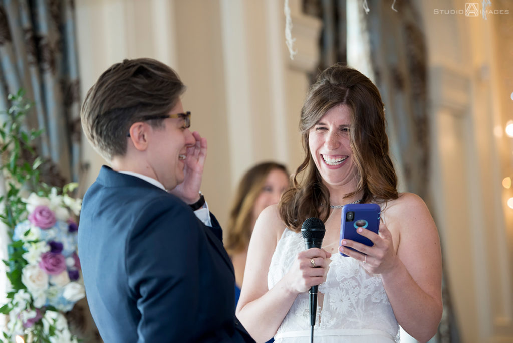 brides at ceremony on wedding day at The Rockleigh | Book Inspired Wedding Photos | Book Themed Wedding Photos | LGBTQ wedding