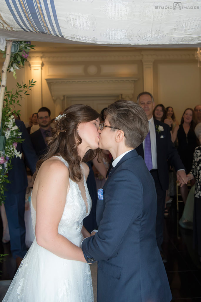 brides at ceremony on wedding day at The Rockleigh | Book Inspired Wedding Photos | Book Themed Wedding Photos | LGBTQ wedding