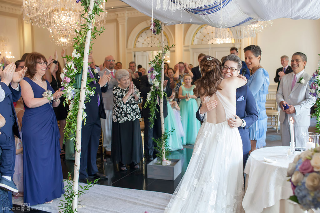brides at ceremony on wedding day at The Rockleigh | Book Inspired Wedding Photos | Book Themed Wedding Photos | LGBTQ wedding