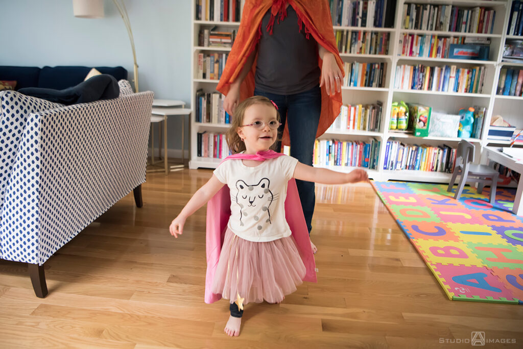 parents playing with their daughter during their Documentary-style day in the life family photo shoot