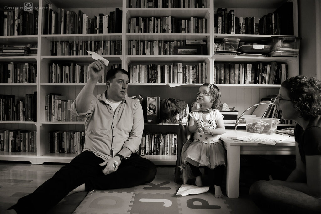 parents playing with their daughter during their Documentary-style day in the life family photo shoot