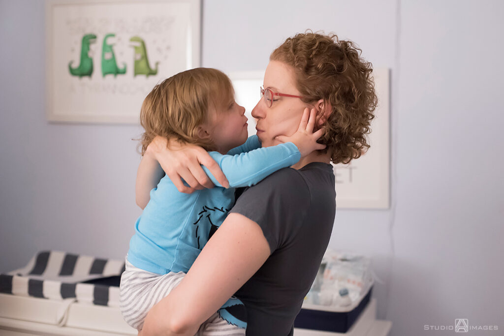 parents and daughter at  bedtime during their Documentary-style day in the life family photo shoot
