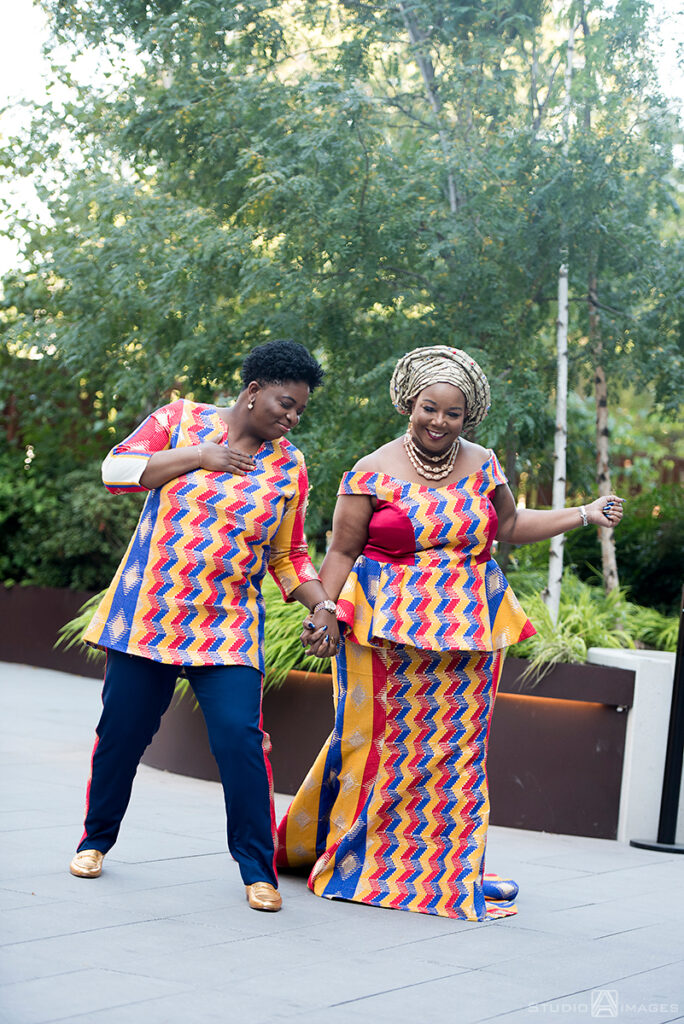 brides in Nigerian-inspired outfits on their wedding day in Brooklyn.  LGBTQ wedding 