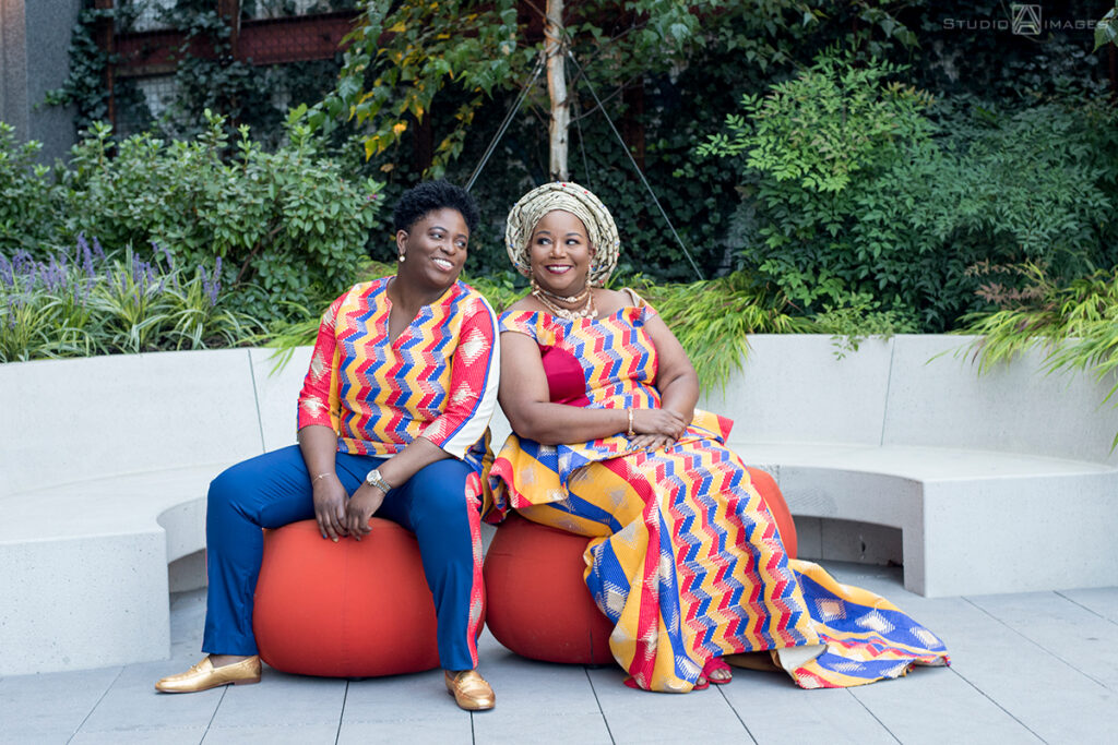 brides in Nigerian-inspired outfits on their wedding day in Brooklyn.  LGBTQ wedding 