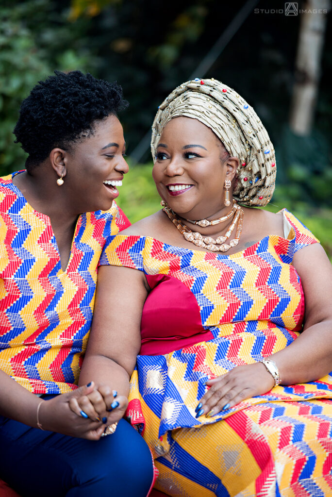 brides in Nigerian-inspired outfits on their wedding day in Brooklyn.  LGBTQ wedding 