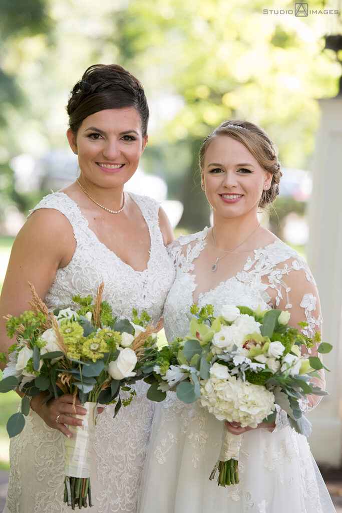brides posing for portraits on their wedding day at Grain House in Basking Ridge. LGBTQ wedding 