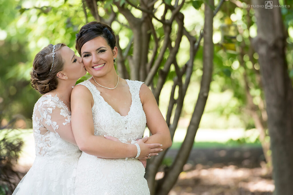 brides posing for portraits on their wedding day at Grain House in Basking Ridge. LGBTQ wedding 