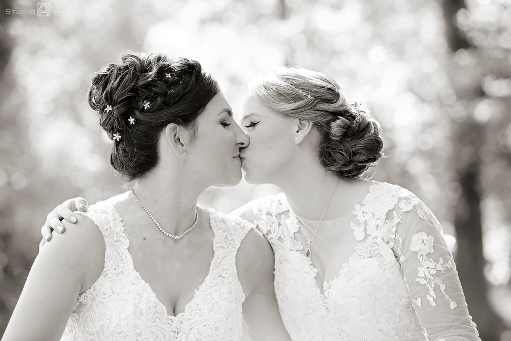 brides posing for portraits on their wedding day at Grain House in Basking Ridge. LGBTQ wedding 