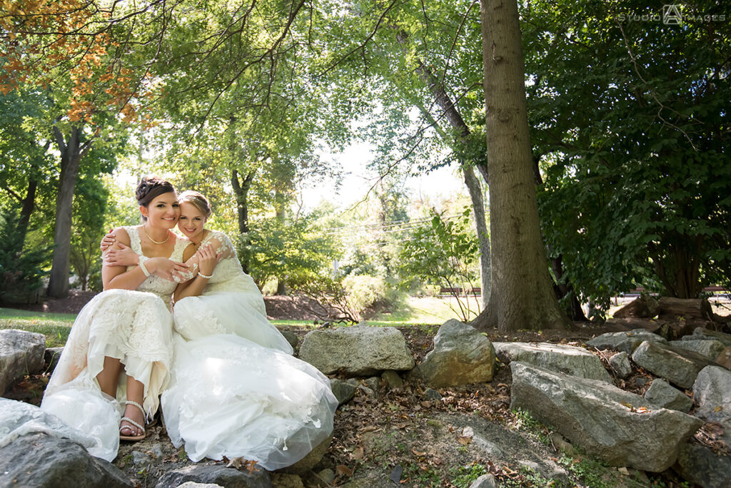 brides posing for portraits on their wedding day at Grain House in Basking Ridge. LGBTQ wedding 