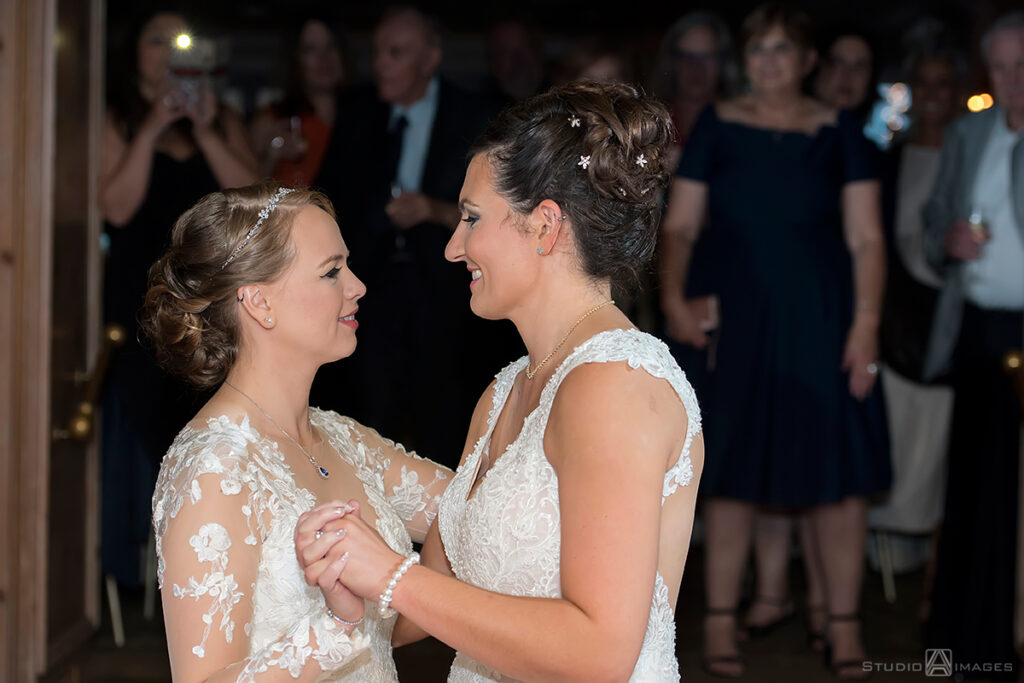 brides dancing their first dance during wedding reception at Grain House in Basking Ridge. LGBTQ wedding 