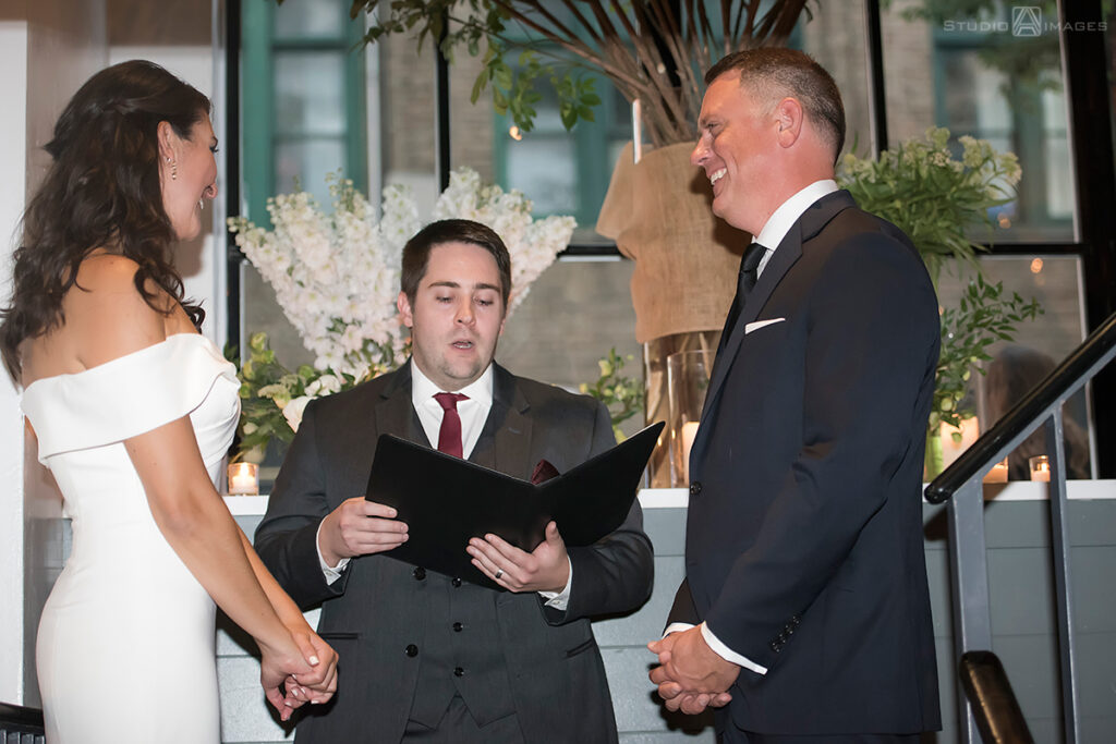 bride and groom during their wedding ceremony at Little Owl Townhouse, NYC