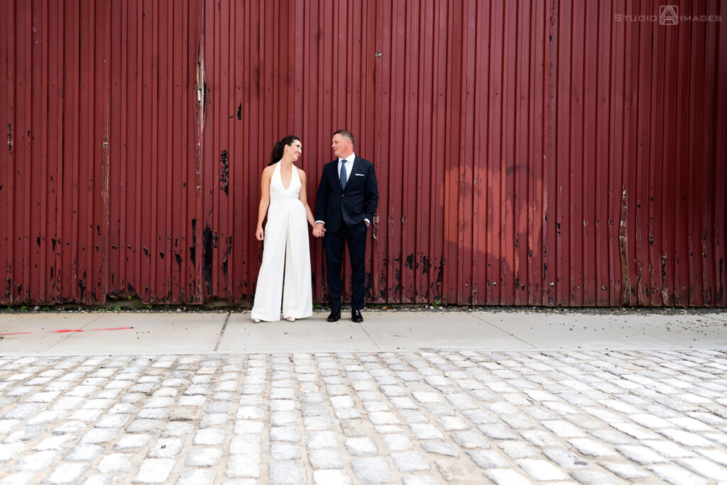 bride and groom on their wedding day in the Hoboken before their wedding reception at Kolo Klub