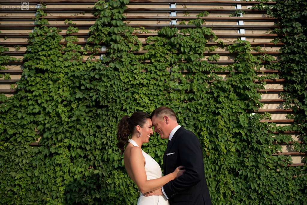bride and groom on their wedding day in the Hoboken before their wedding reception at Kolo Klub