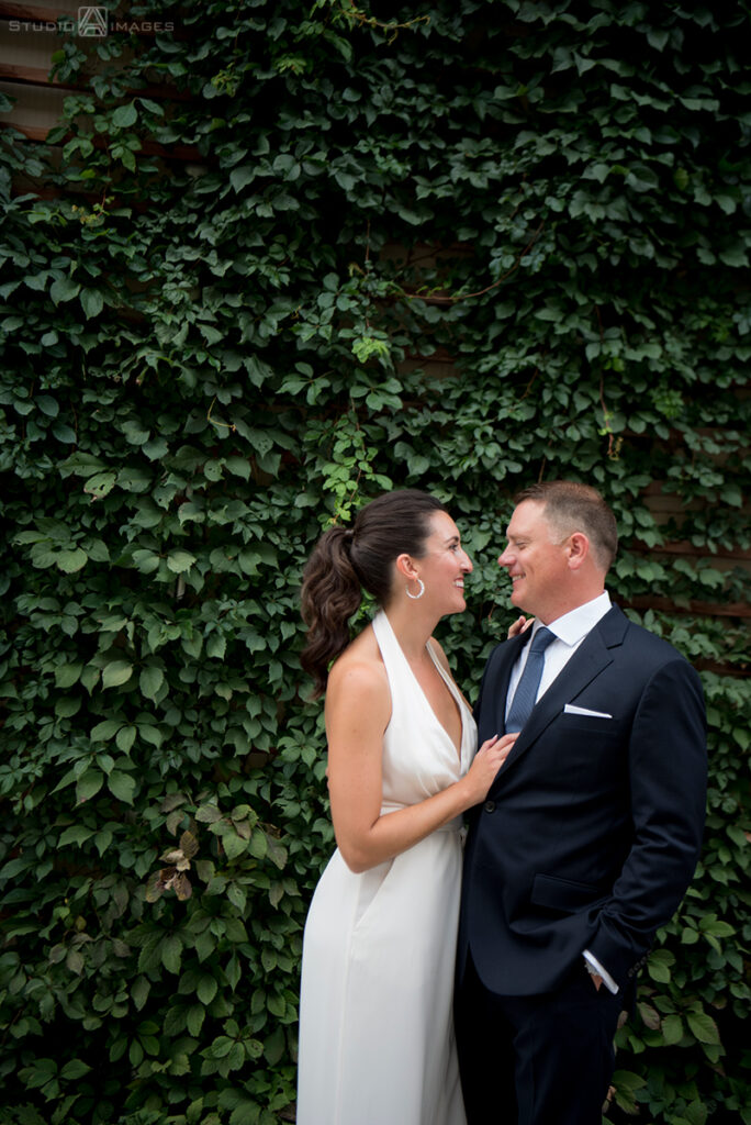 bride and groom on their wedding day in the Hoboken before their wedding reception at Kolo Klub