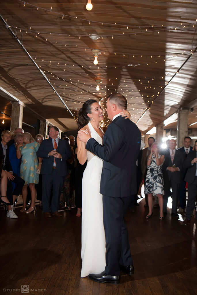 bride and groom dancing their first dance at wedding reception at Kolo Klub