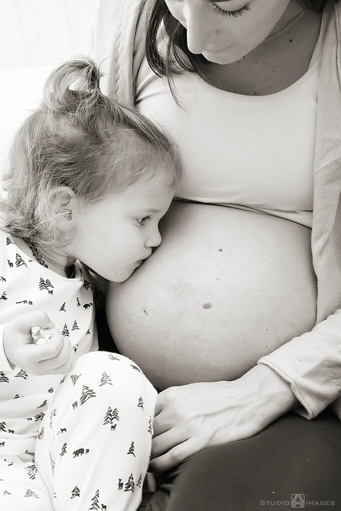 Long Island family photos of daughter with her pregnant mom