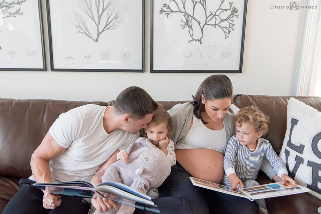 Long Island family photos reading on couch