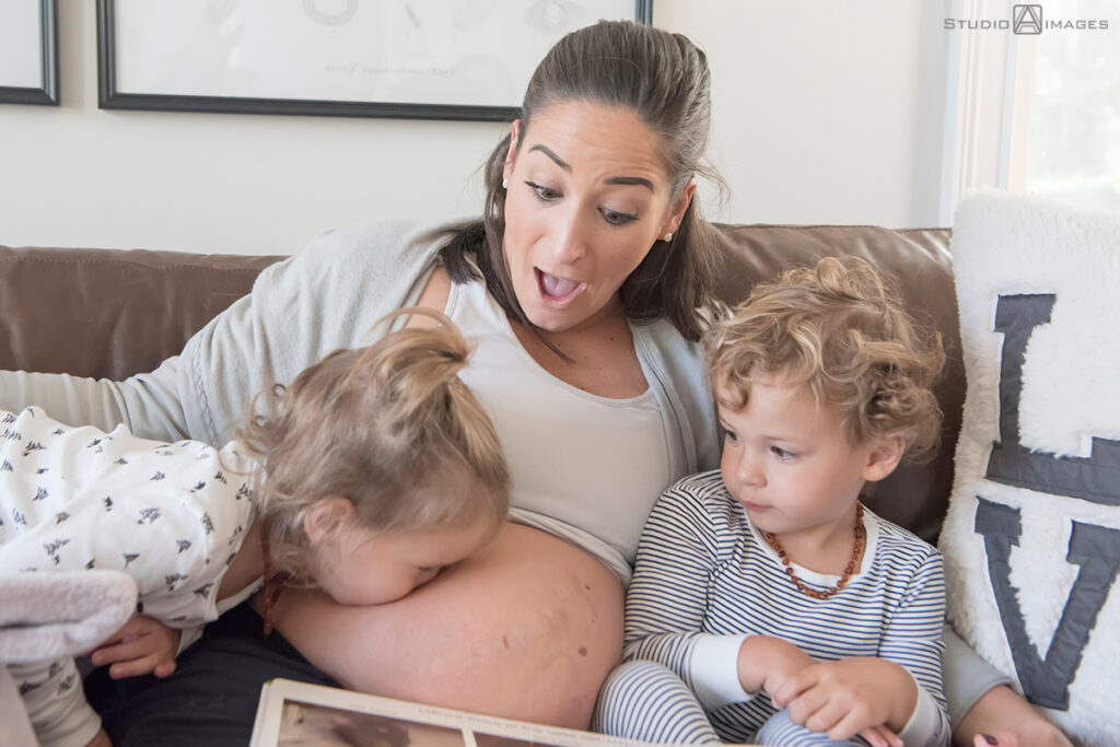 Long Island family photos reading on couch