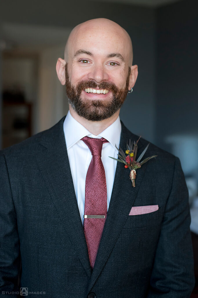 groom getting ready for his wedding in his apt in Jersey City