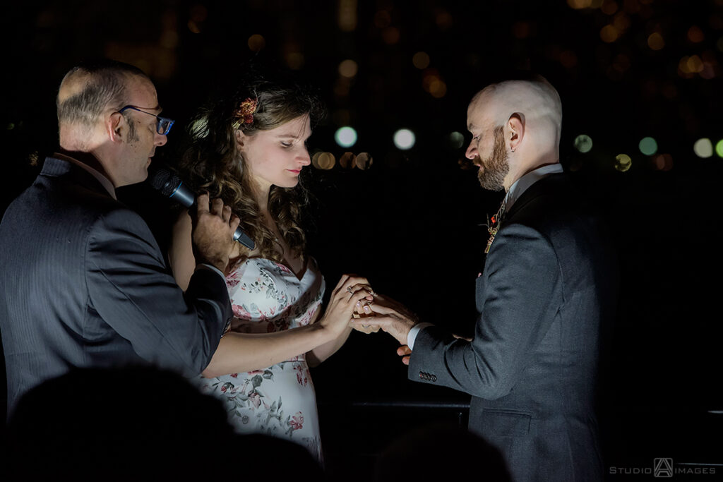 bride and groom during their wedding ceremony at Liberty House in Jersey City
