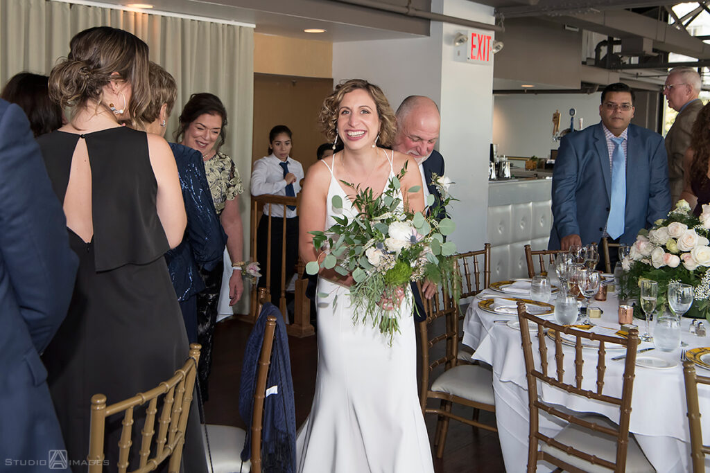 bride during wedding ceremony at Molo's Restaurant in Weehawken