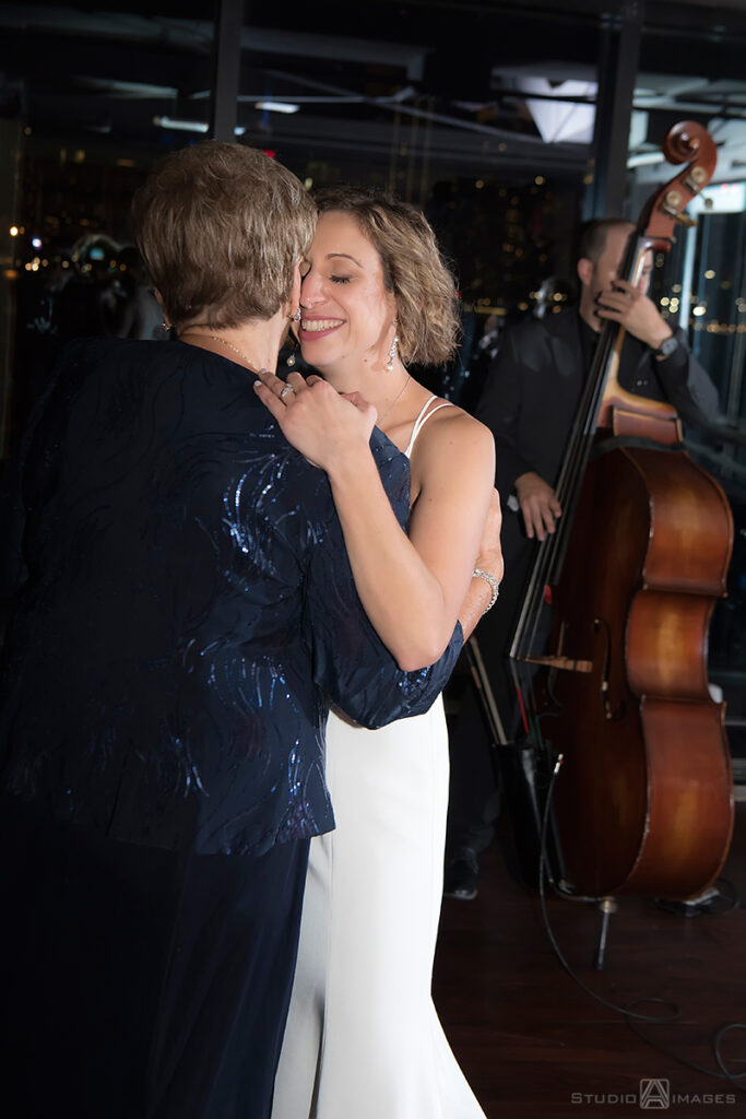 bride and her grandmother dancing at Molo's Restaurant in Weehawken
