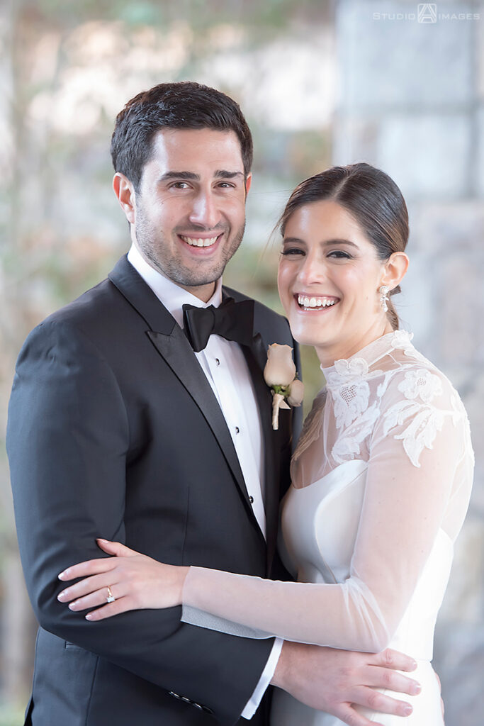 bride and groom on their wedding day at Temple Emanu-El of Closter