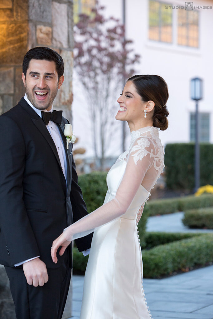 bride and groom on their wedding day at Temple Emanu-El of Closter