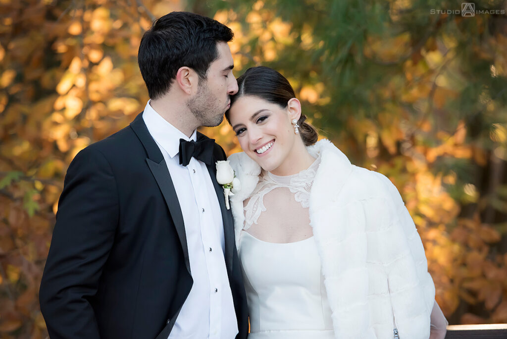 bride and groom on their wedding day at Temple Emanu-El of Closter