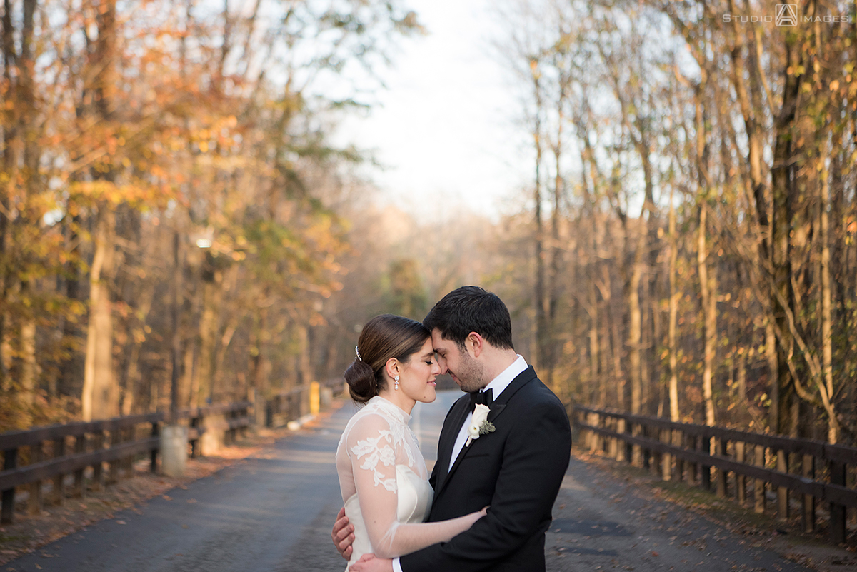 bride and groom on their wedding day at Temple Emanu-El of Closter