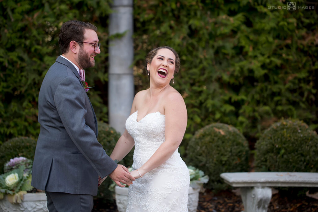 bride and groom's first look at Florentine Gardens on their wedding day