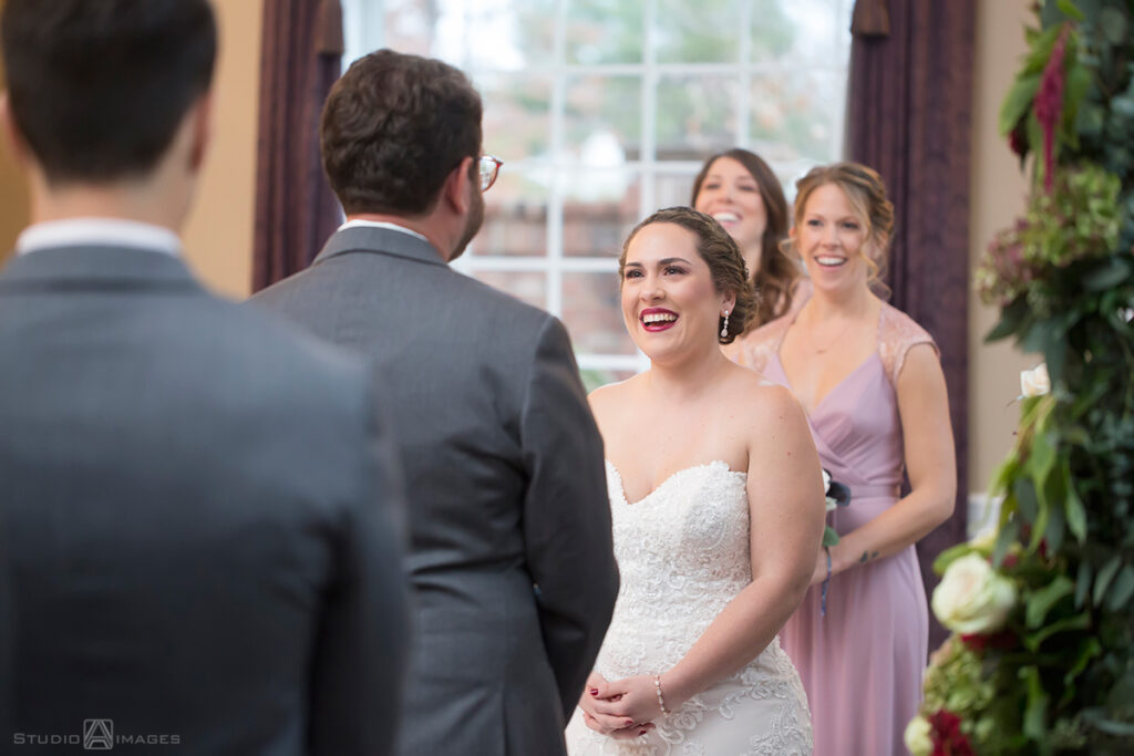 bride and groom during their wedding ceremony at Florentine Gardens 