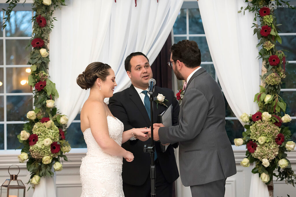 bride and groom during their wedding ceremony at Florentine Gardens 