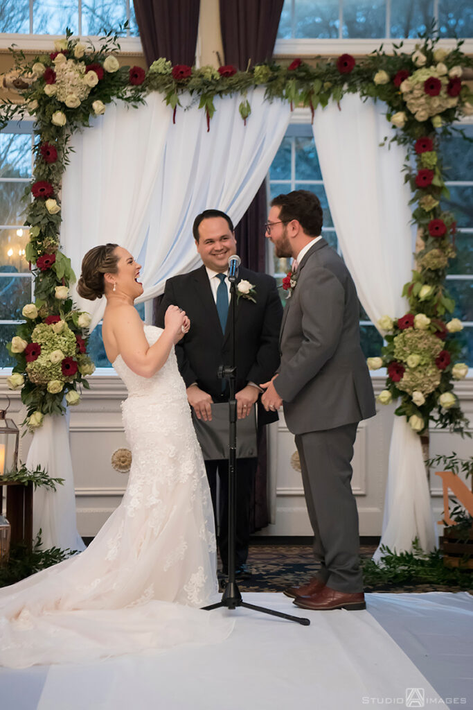 bride and groom during their wedding ceremony at Florentine Gardens 