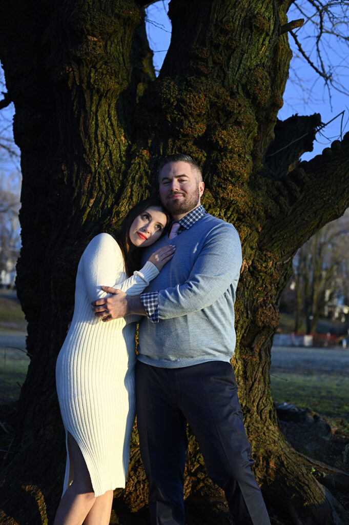 couple smiling at dawn during their sunrise engagement session in Nyack