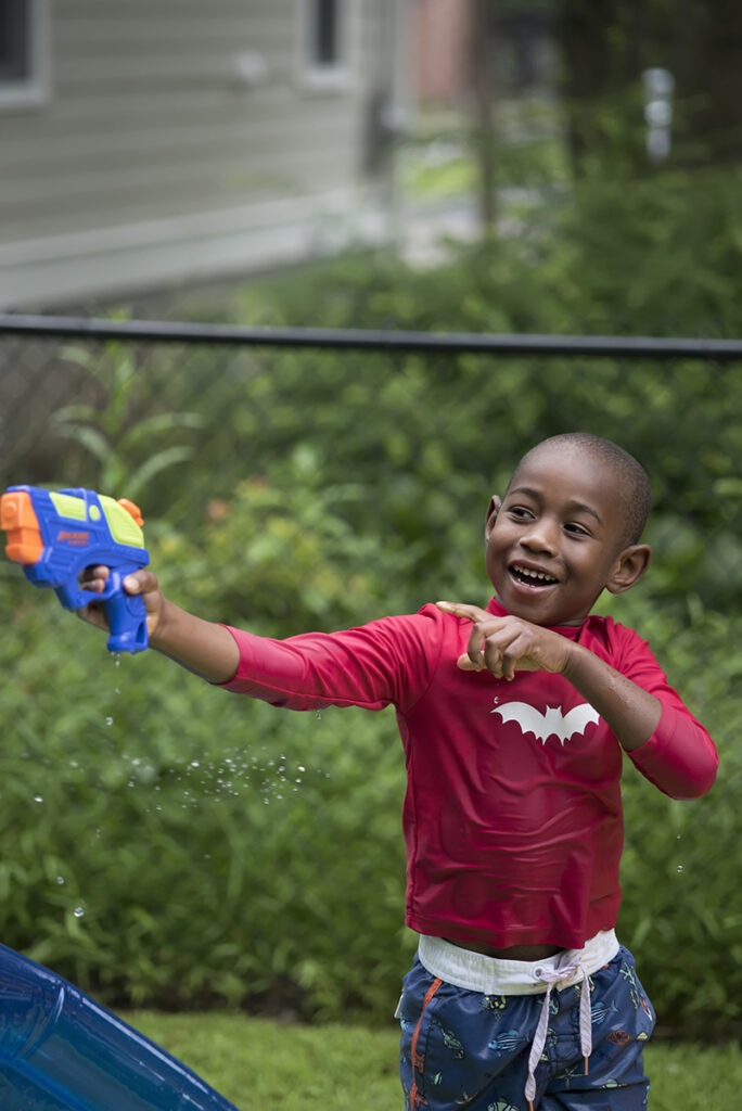 kids playing during their Day in the Life family session in Scarsdale, New York