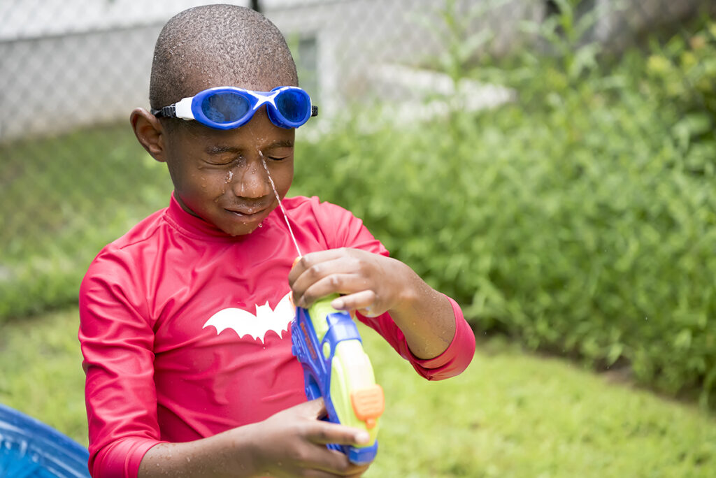 kids playing during their Day in the Life family session in Scarsdale, New York