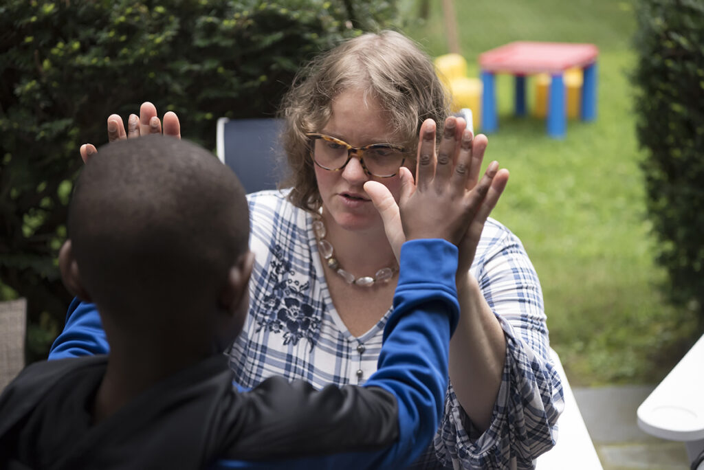 kids with their moms during their Day in the Life family session in Scarsdale, New York