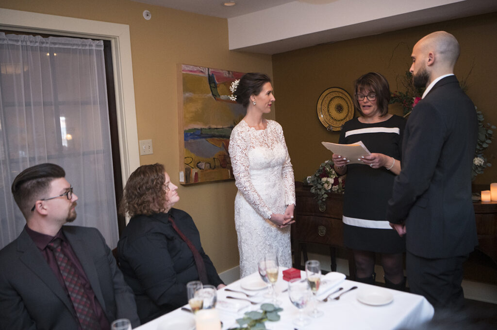 bride and groom during wedding ceremony on wedding day at  Moonstruck in Asbury Park