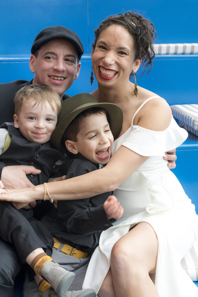 bride and groom with their kids on wedding day at The Asbury Hotel in Asbury Park