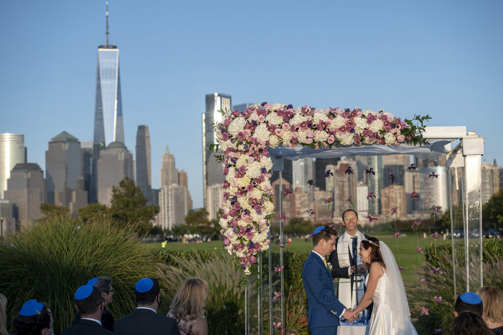 bride and groom during a Jewish wedding ceremony at Liberty House in Jersey City