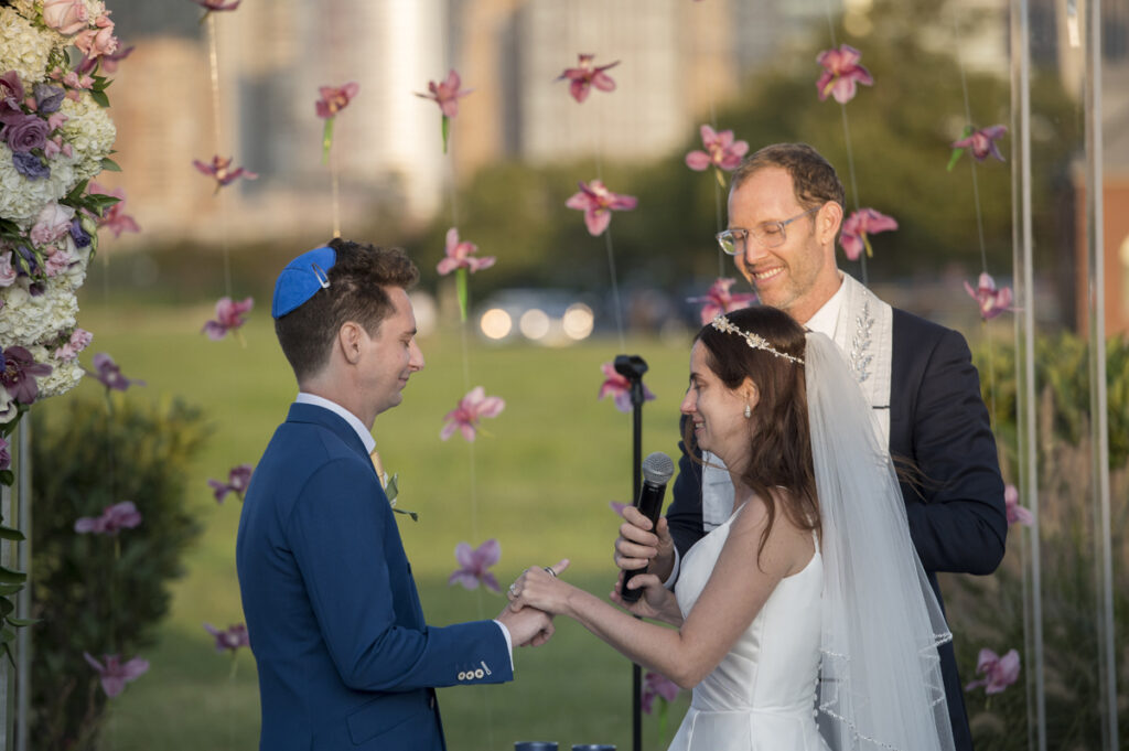 bride and groom during a Jewish wedding ceremony at Liberty House in Jersey City