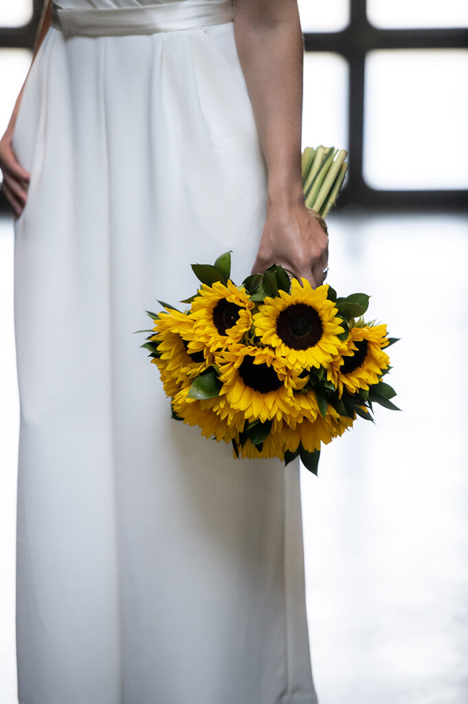 bride's sunflower bouquet on wedding day at The Foundry in Long Island City