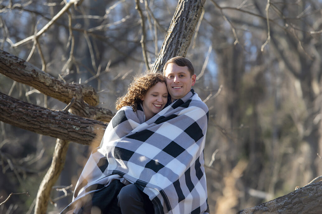 engaged couple at Hartshorne Woods Park. Engagement photos