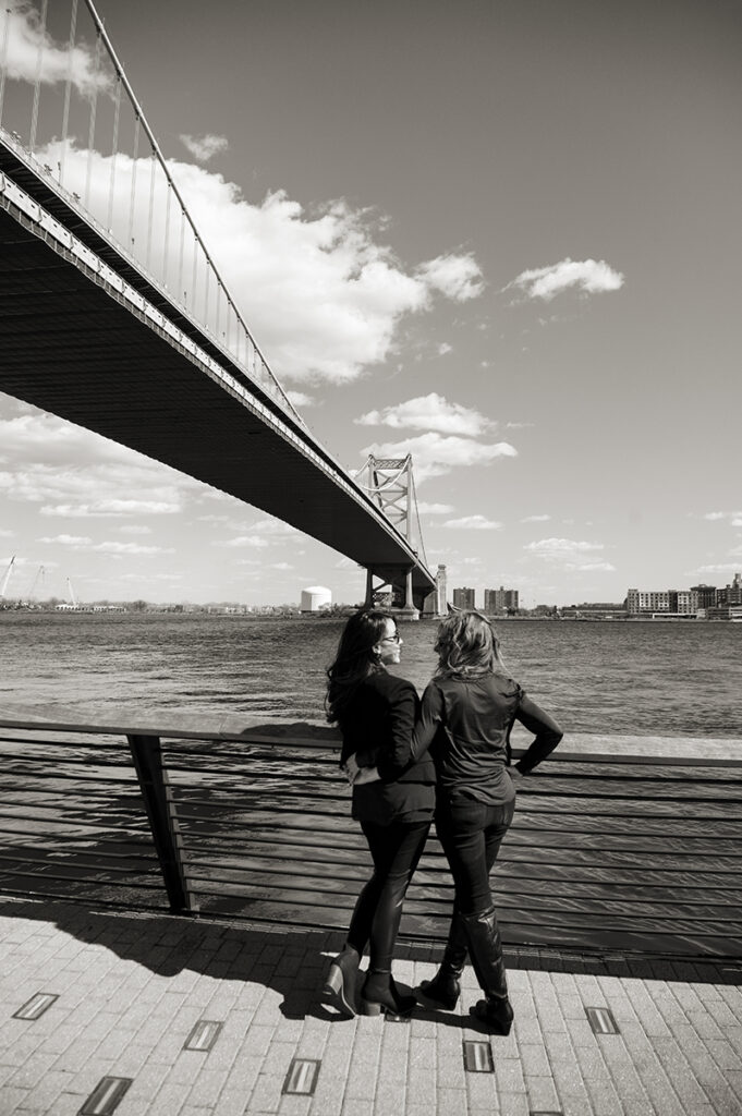 LGBTQ couple at Penn's Landing during their Philadelphia Engagement Session