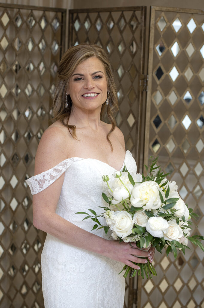 bride on wedding day at Windows on the Water at Frogbridge. LGBTQ wedding