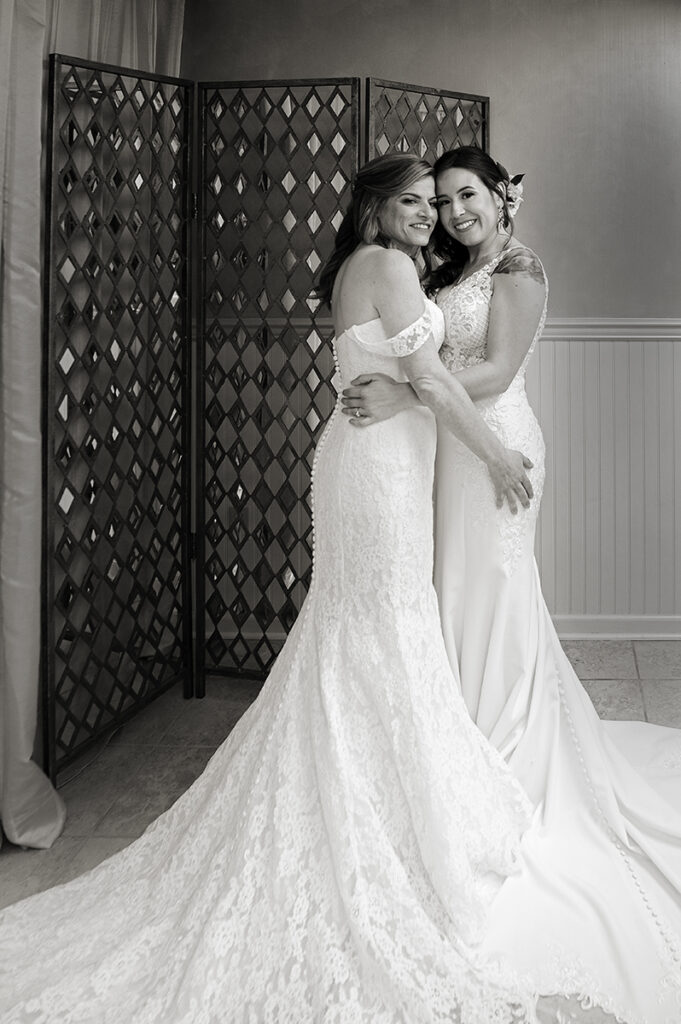 brides on wedding day at Windows on the Water at Frogbridge. LGBTQ wedding