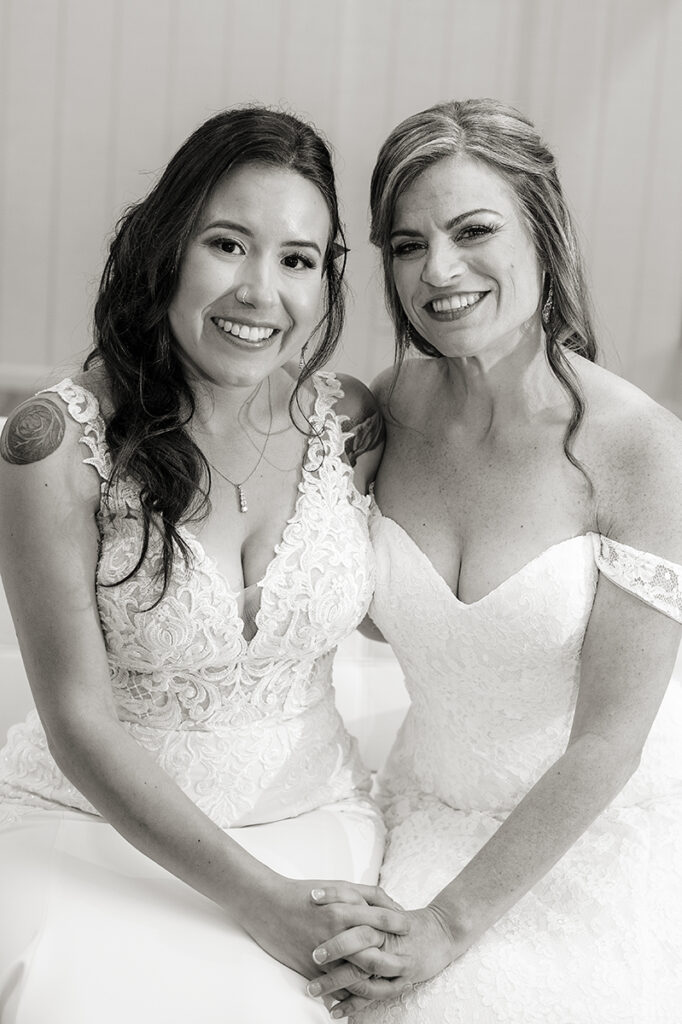 brides on wedding day at Windows on the Water at Frogbridge. LGBTQ wedding
